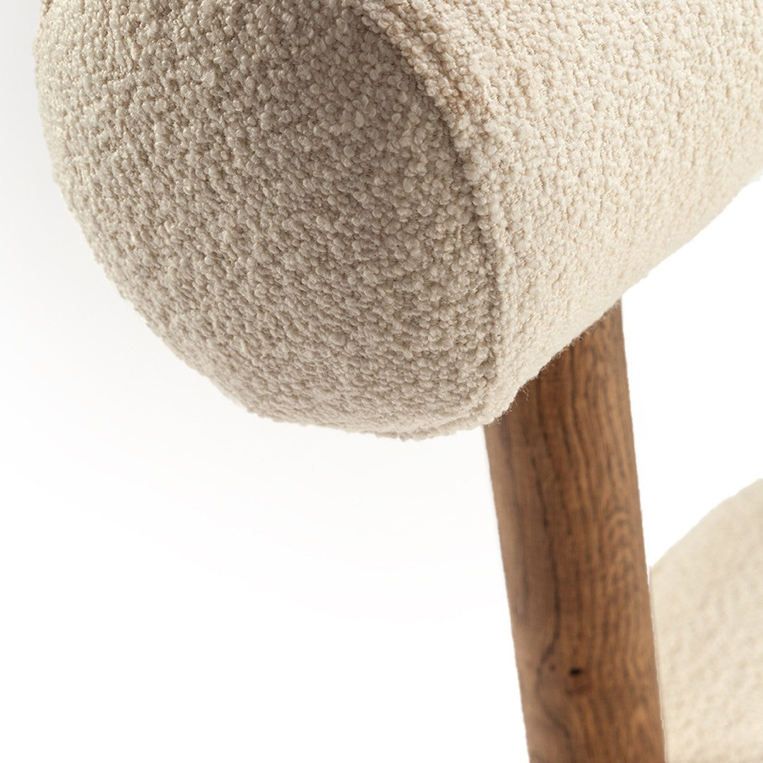Cream textured fabric with a soft, fluffy pattern and wooden base accent. Ideal for modern home decor.
