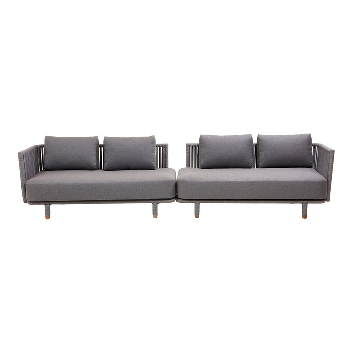 Gray outdoor sectional sofa with textured cushions and sleek wooden legs, perfect for modern patios.
