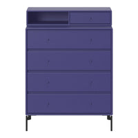 Vibrant purple dresser with a textured finish and sleek black legs, featuring minimalist drawer handles.