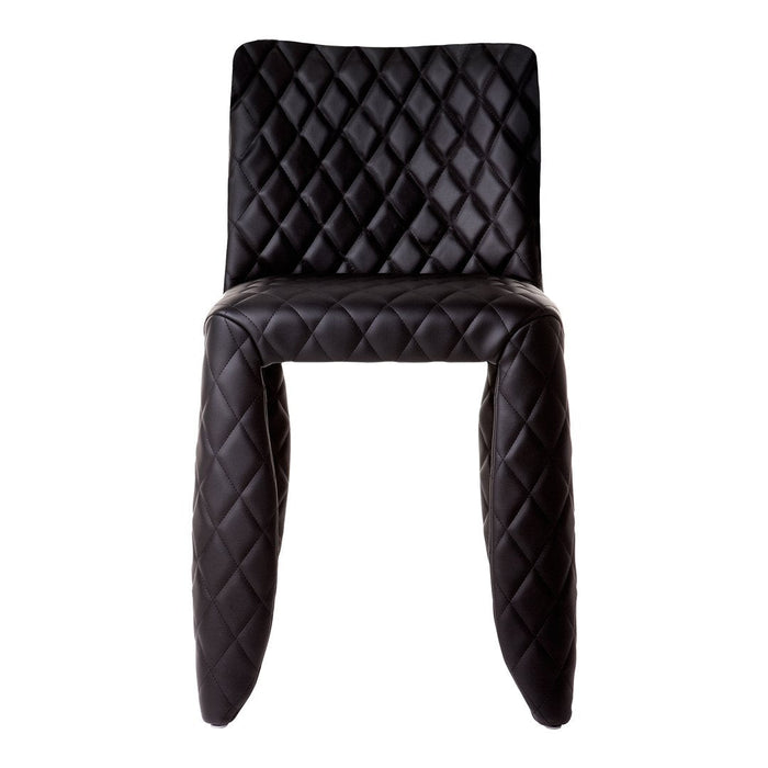 Black quilted chair with a diamond pattern, featuring smooth, sleek upholstery for modern decor.