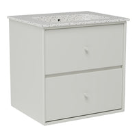 White dresser with a speckled gray countertop and simple, modern drawer design. Ideal for any decor style.