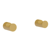 Gold round door knobs with a sleek and minimalist design, adding a touch of elegance to any space.