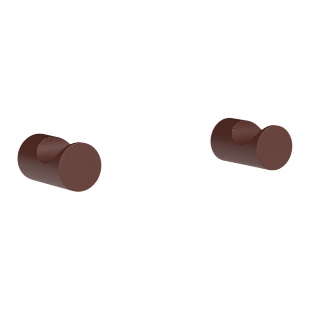 Brown cylindrical knobs with a smooth, matte finish. Ideal for modern home decor and furniture upgrades.