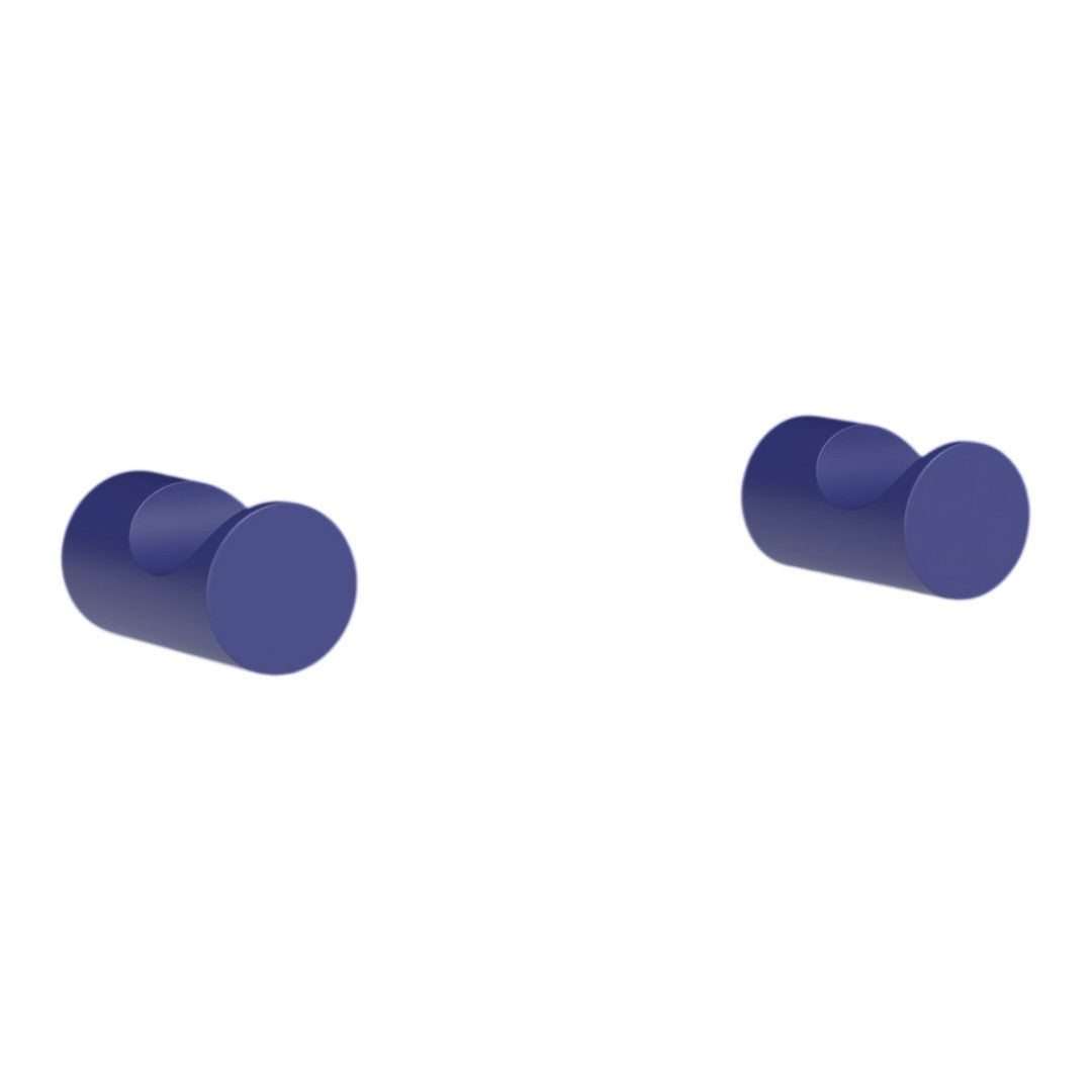 Two round, deep blue knobs with a smooth finish against a white background. Ideal for modern decor.