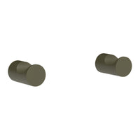 Matte olive green round knobs with a smooth finish, perfect for modern home décor.