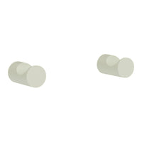 Smooth, round wall hooks in soft white color, featuring a minimalist design for modern decor.