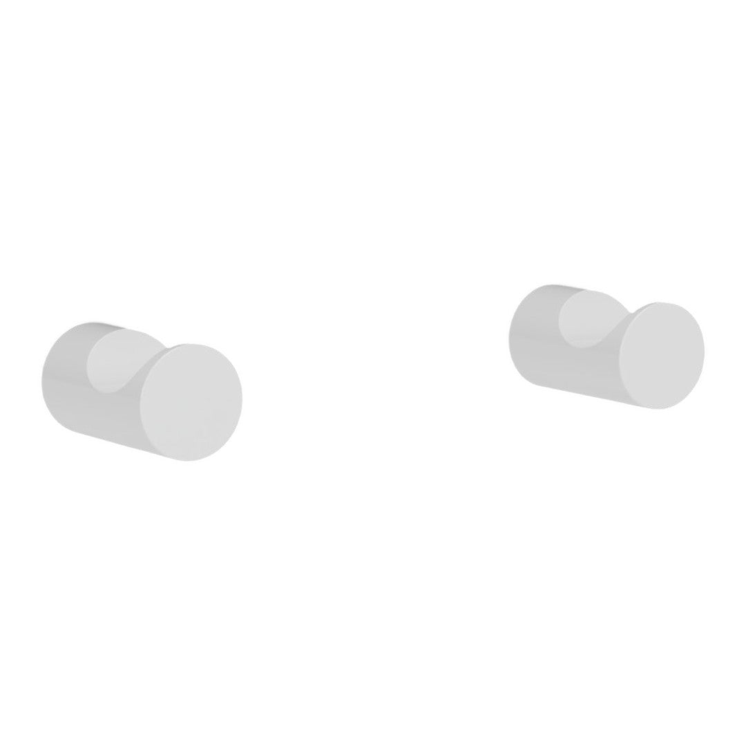 White minimalist round wall hooks with a smooth matte finish, perfect for modern decor.