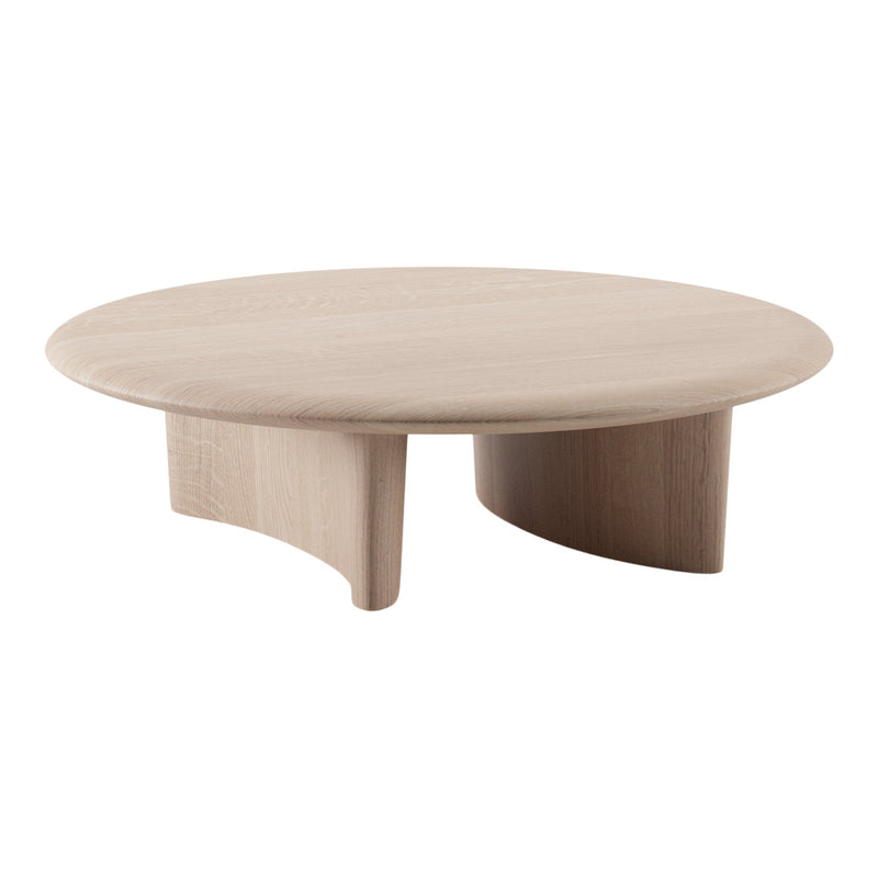 Light oak round coffee table with smooth wood grain and natural finish, featuring a minimalist design.
