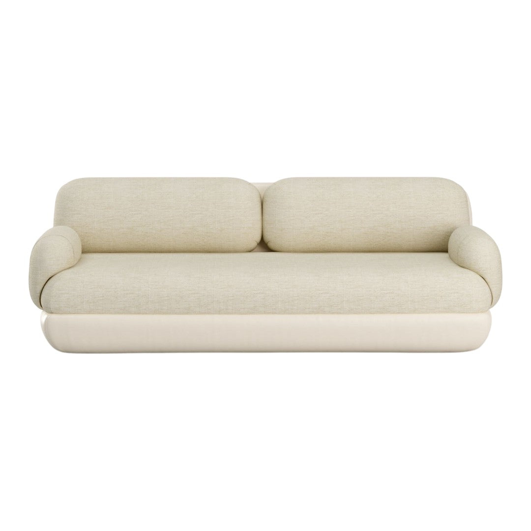 Cream-colored sofa with a smooth, textured fabric and rounded arms. Elegant, minimalist design for modern interiors.