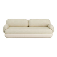Cream-colored sofa with a smooth, textured fabric and rounded arms. Elegant, minimalist design for modern interiors.