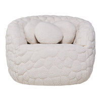 Cream-colored plush chair with a textured, cloud-like pattern and rounded cushions. Perfect for cozy spaces.