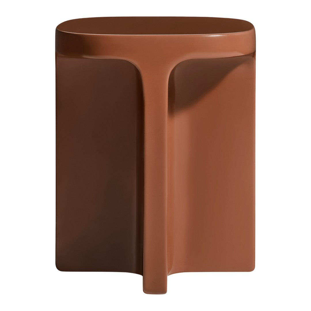 Brown sculptural stool with a smooth, matte finish and modern design. Perfect for contemporary decor.