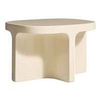 Beige sculptural side table with a smooth finish and modern geometric design. Simple, contemporary style accent.