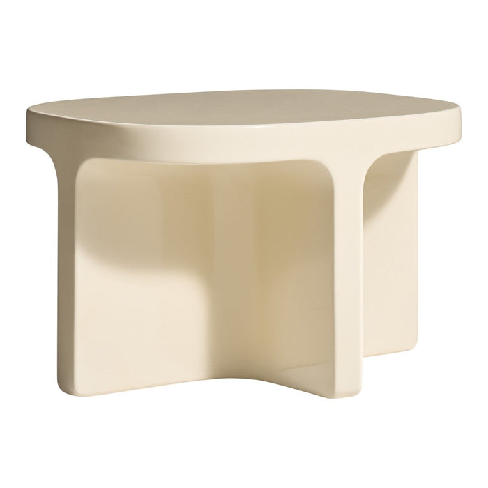 Beige sculptural side table with a smooth finish and modern geometric design. Simple, contemporary style accent.