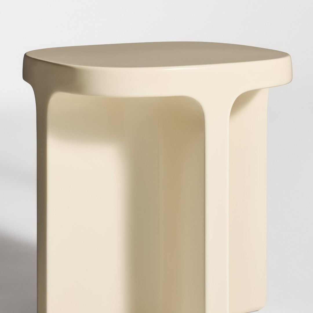 Beige minimalist stool with smooth, rounded edges and a modern design, perfect for contemporary decor.