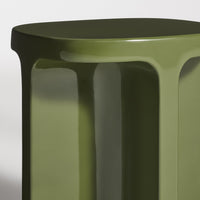 Glossy olive green table with smooth, curved edges and a modern design.