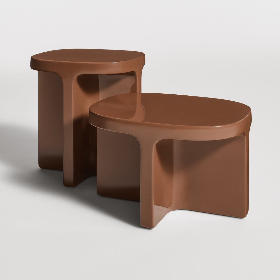 Set of two modern side tables featuring a rich, warm brown color with smooth, curved edges and a minimalist design.