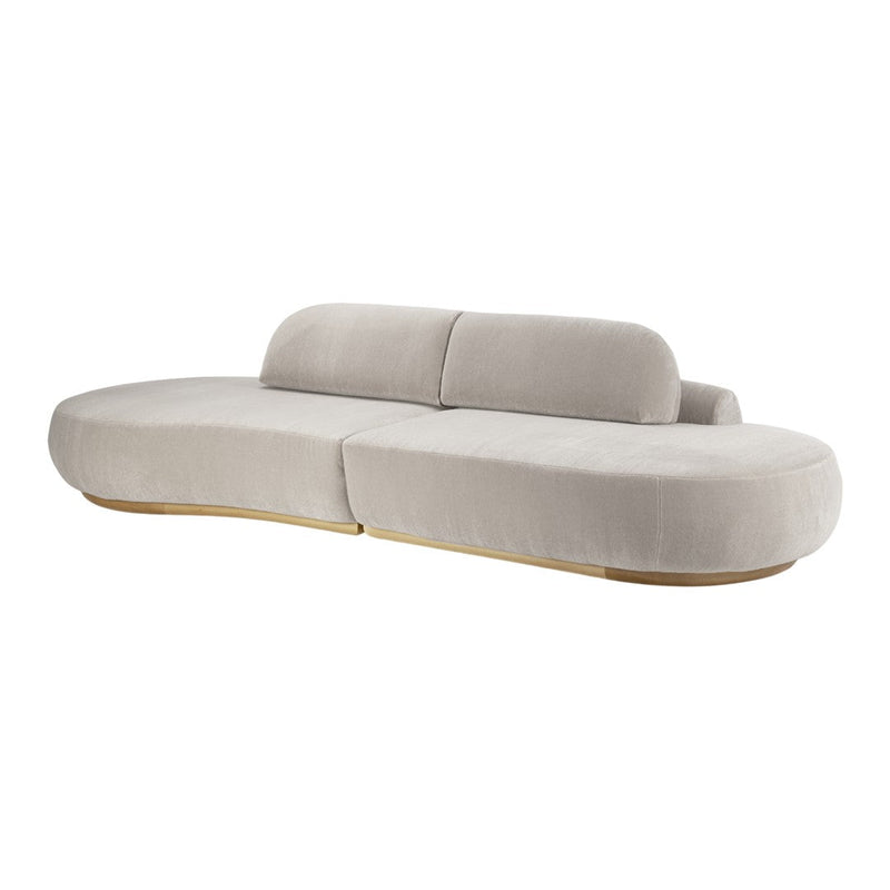 Beige modern sofa with smooth upholstery and curved lines, featuring a minimalist design and wooden base.
