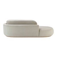 Modern curved sofa in soft gray fabric with a seamless design and minimalist aesthetic. Perfect for contemporary decor.