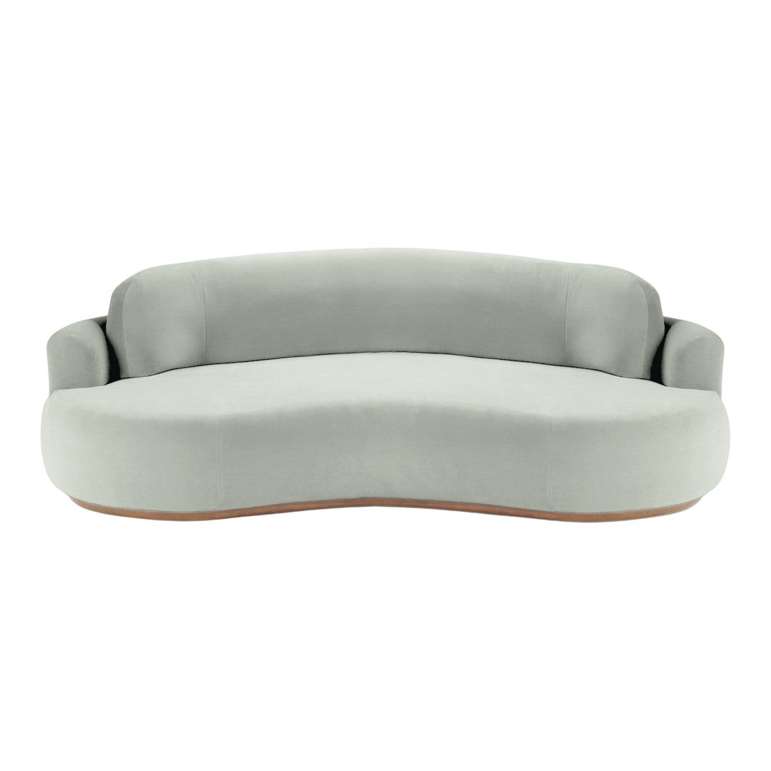 Curved light gray sofa with smooth fabric and a minimalist design featuring a subtle wood base.