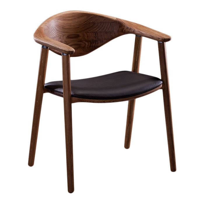 Stylish wooden chair with a walnut finish and a sleek black leather seat, featuring a curved back design.