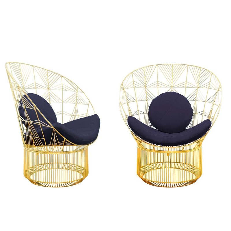 Gold wireframe chairs with geometric patterns and navy blue cushions for a modern touch.