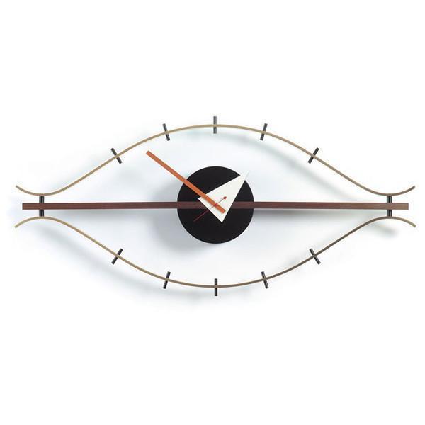 Mid-century modern wall clock featuring black, white, and copper tones with wavy metal lines and circular patterns.
