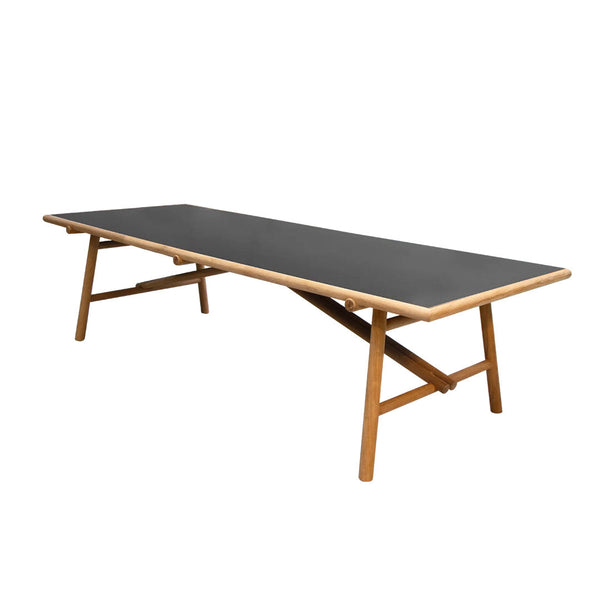 Stylish black tabletop with natural wood legs, featuring a sleek, minimalist design perfect for modern decor.