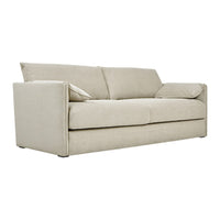 Light beige sofa with a smooth, solid fabric texture, offering a minimalist design for modern interiors.