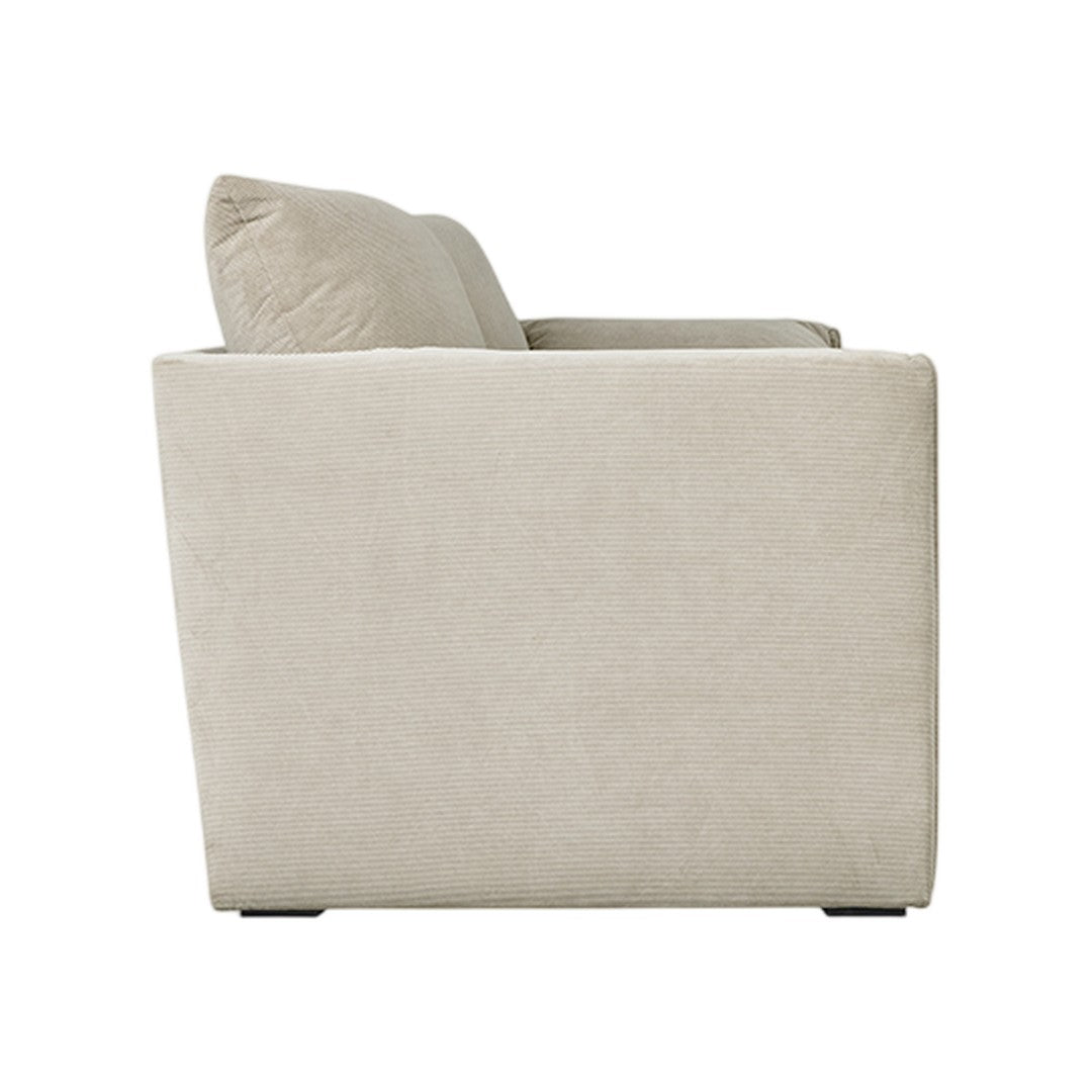Beige upholstered sofa with a smooth texture and clean, minimalistic design. Perfect for modern interiors.