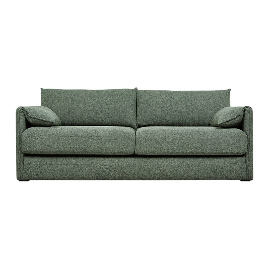 Modern green sofa with a textured fabric and clean lines, featuring plush cushions for added comfort.