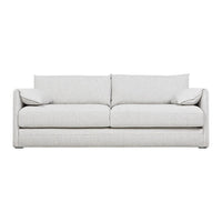 Light gray sofa with a smooth, minimalist design and soft, plush cushions for a modern aesthetic.