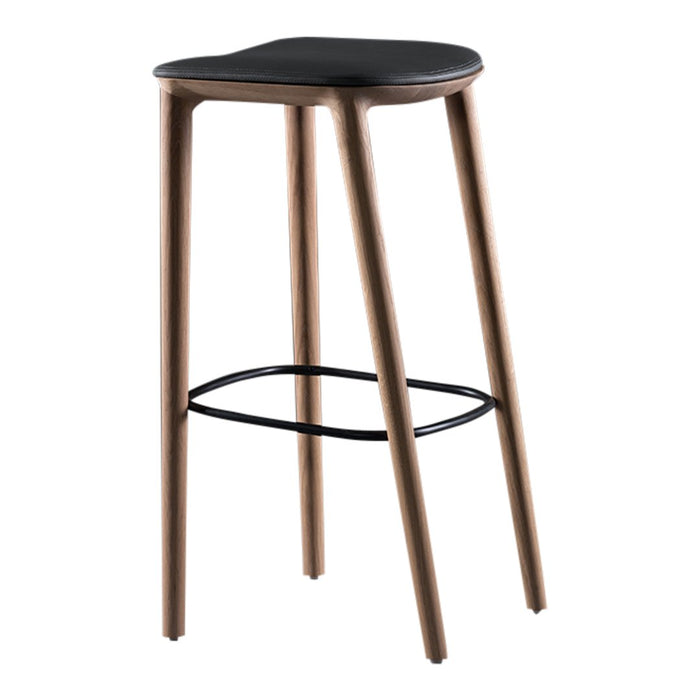Stylish black seat atop sleek wood legs with a modern finish and minimalistic design, featuring a black footrest.