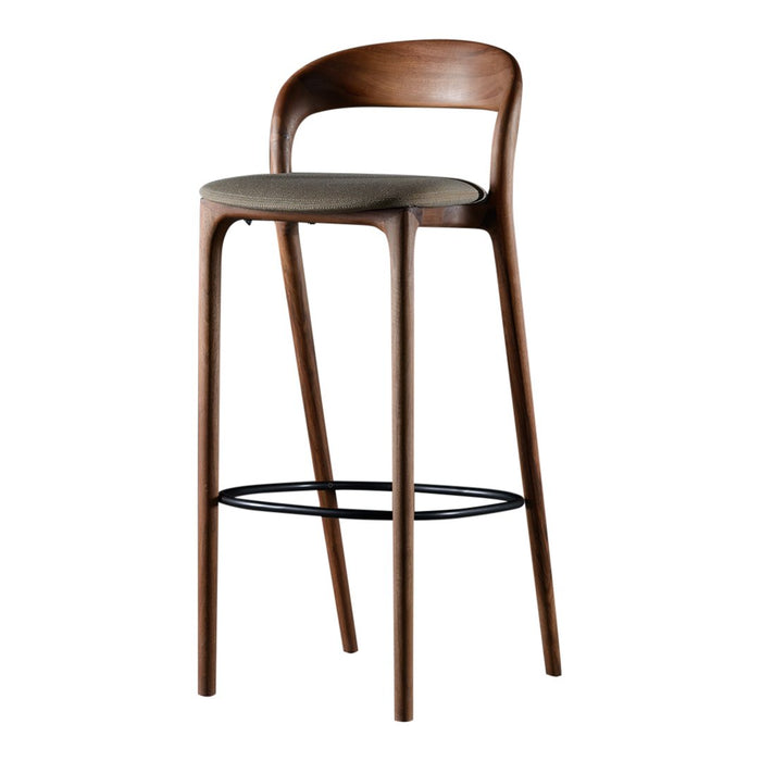 Stylish bar stool with a rich walnut finish and a sleek black metal footrest, featuring a neutral upholstered seat.
