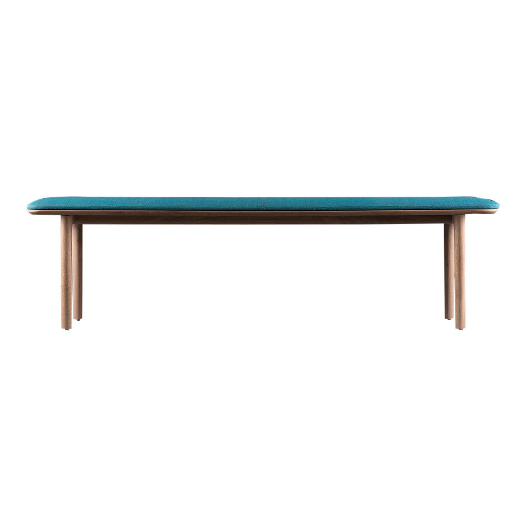 Teal upholstered bench with natural wood legs, featuring a sleek, modern design and no intricate patterns.