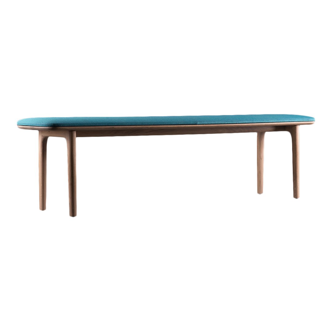 Teal upholstered tabletop with smooth walnut wood legs, featuring a sleek, modern design. Perfect for contemporary spaces.