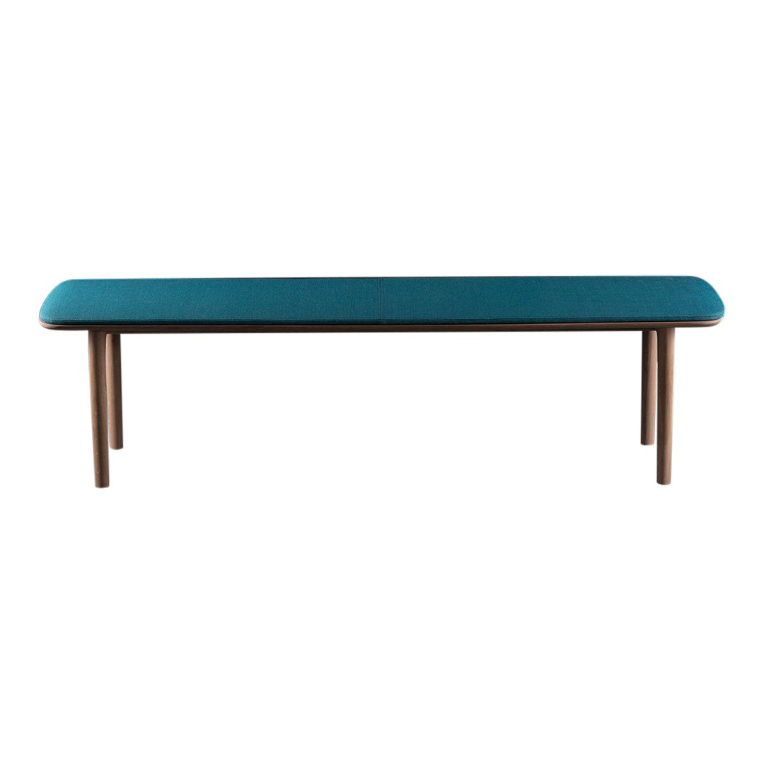 Teal upholstered bench with a smooth finish and wooden legs, perfect for modern home decor.