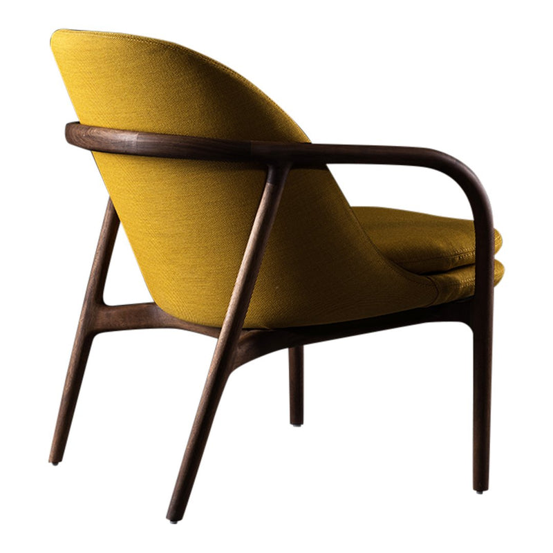 Mustard yellow upholstered chair with a curved wooden frame, showcasing a modern and minimalist design.