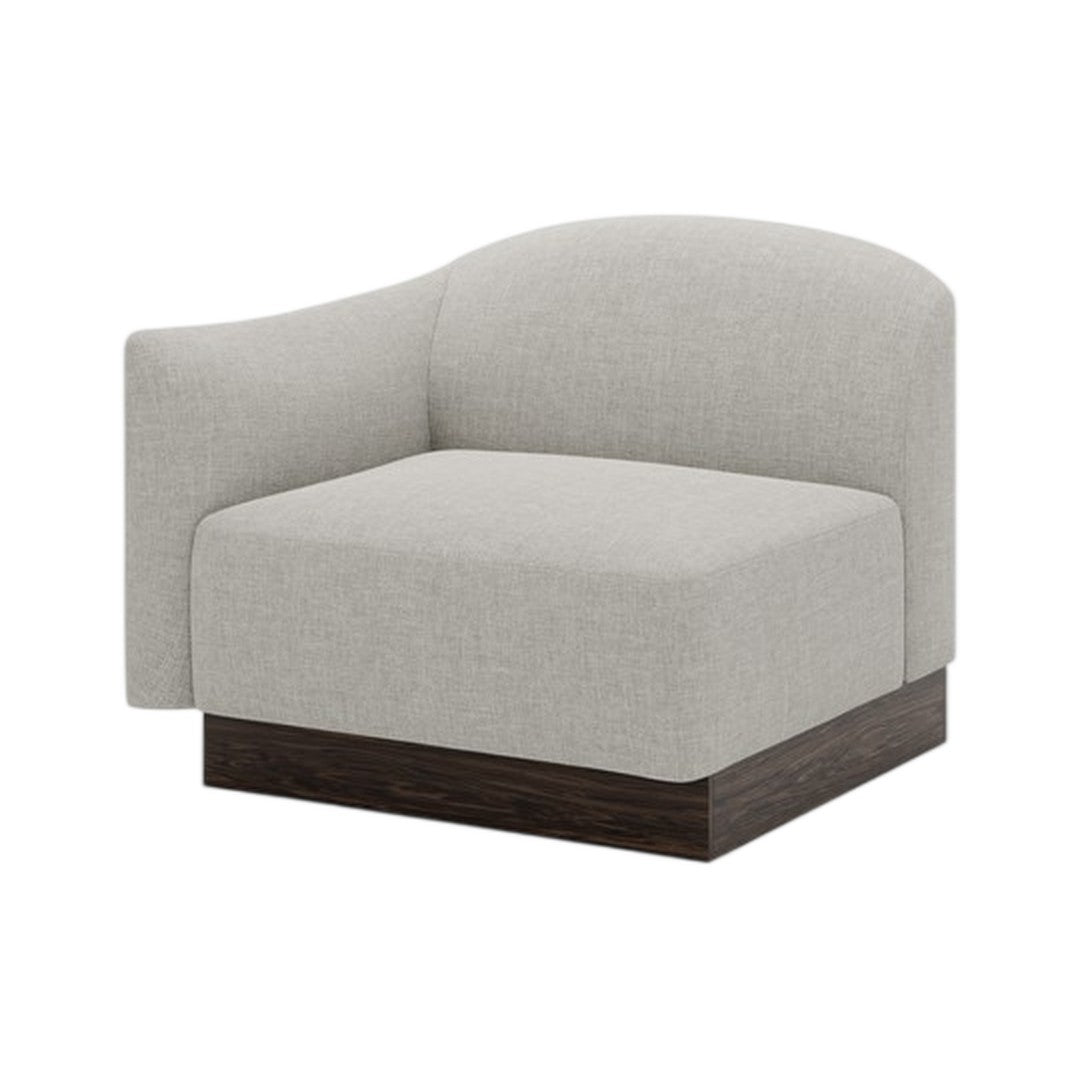 Light gray upholstered chair with a modern curved design and dark wood base. Ideal for contemporary living spaces.
