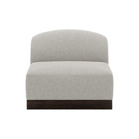 Light gray upholstered chair with a smooth finish and dark wood base, minimalistic design. Perfect for modern decor.