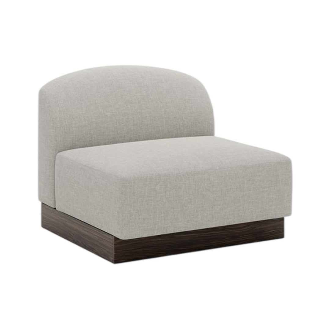 Gray upholstered chair with a smooth, minimalist design and a dark wood base, ideal for modern interiors.