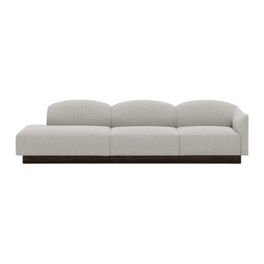 Modern light beige sofa with a smooth, arched design and dark wooden base, perfect for contemporary interiors.