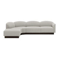 Light gray curved sectional sofa with smooth fabric and dark wood base, ideal for modern living spaces.