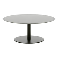 Round coffee table featuring a sleek gray top and black circular base, ideal for modern decor.