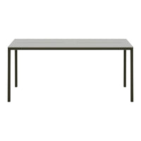 Modern rectangular table in a sleek gray finish with minimalist black metal legs, featuring a smooth, solid surface.