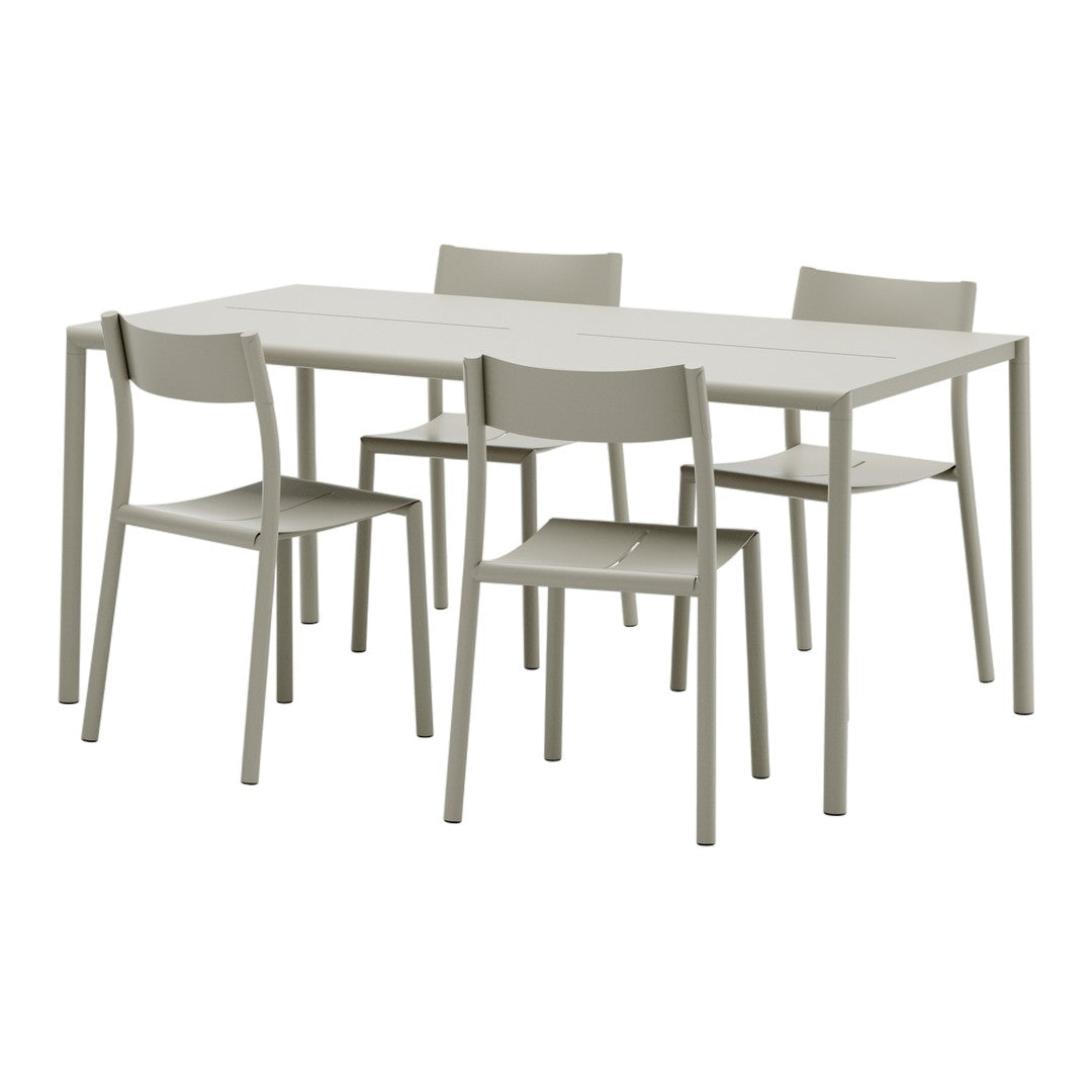 Light gray dining table with four matching chairs, showcasing a minimalist design and smooth surfaces.