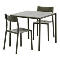 Green minimalist dining table and chairs set, featuring a sleek, solid pattern and matte finish. Perfect for modern spaces.