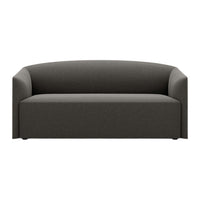 Modern dark gray sofa with a minimalist design and smooth, curved lines. Perfect for contemporary living spaces.
