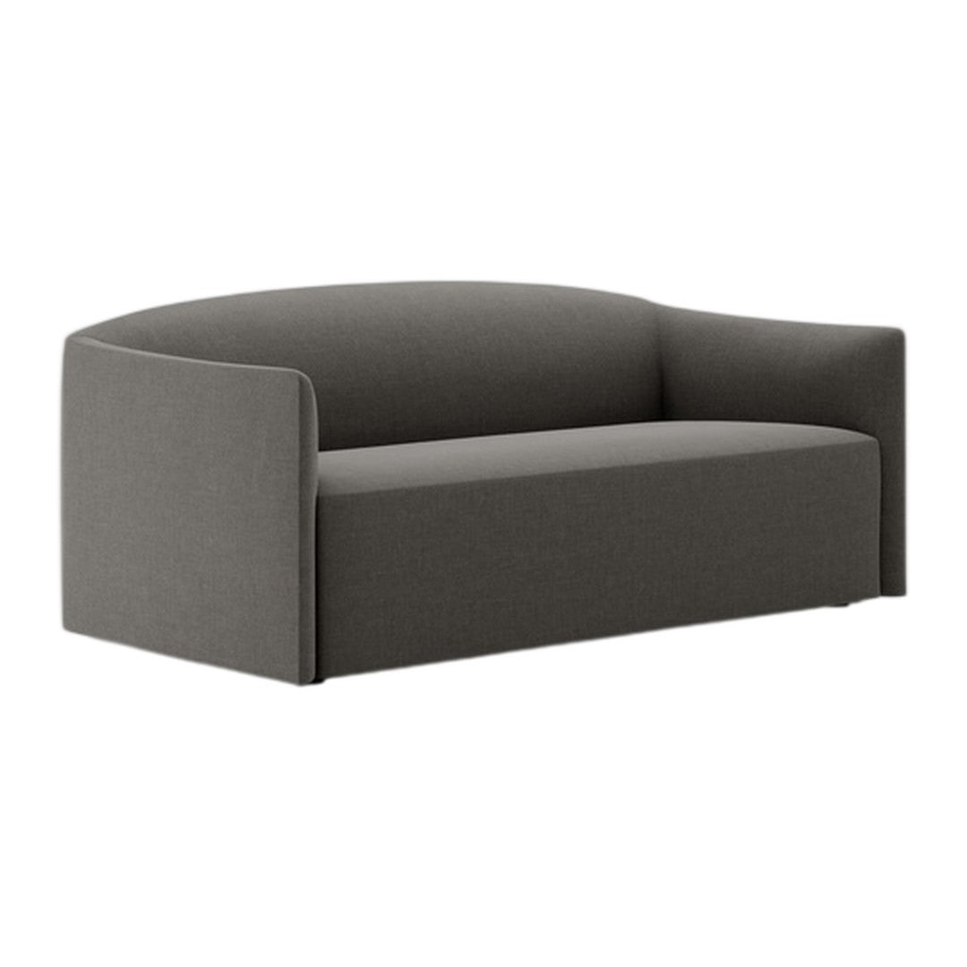 Gray upholstered sofa with a minimalist curved design and solid color pattern, perfect for modern decor.