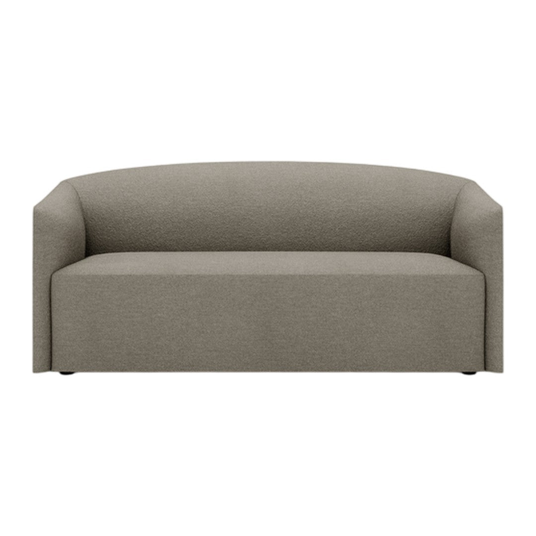 Neutral gray sofa with a smooth, minimalist design and rounded edges, perfect for modern interiors.